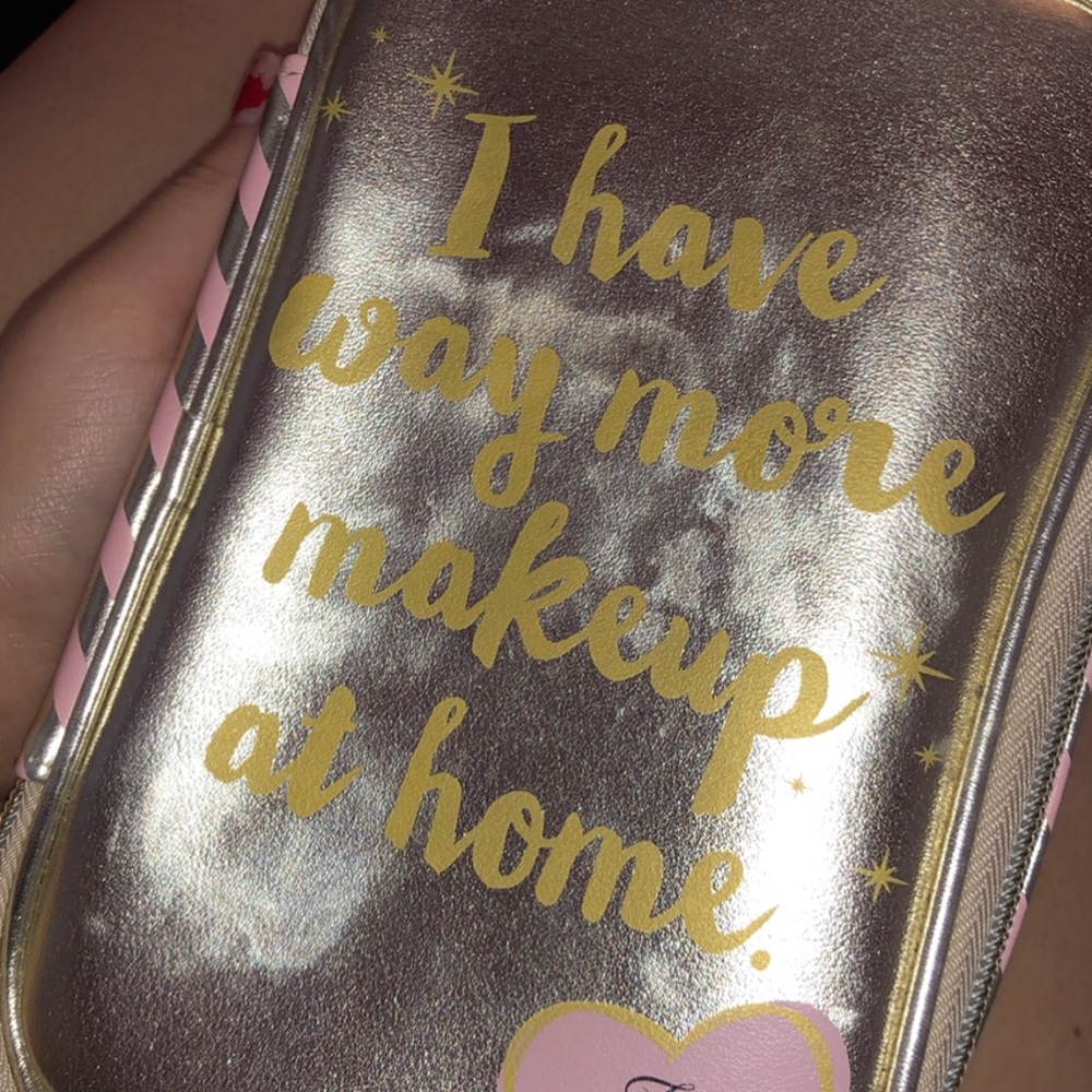 Three pallets with make up bag